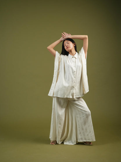 Vanshitaaz Flowing Ivory Cape Shirt & Wide-Leg Pants Set
